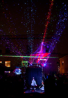 We perform every year at a night art event called FoolMoon. This happens in  Ann Arbor, Michigan in early April. In 2018 we froze our collective asses off, but still managed to put on a show out in the street, projecting onto buildings. Then it started to snow. It looked like technicolor confetti.